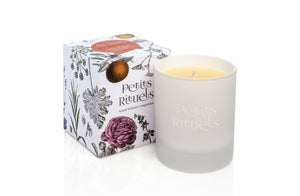 Petits Rituels organic Christmas candle outside its packaging.