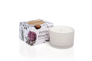Petitgrain travel candle in white frosted glass and floral packaging.