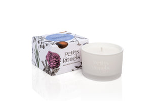 Sleep candle in white frosted glass and floral packaging.