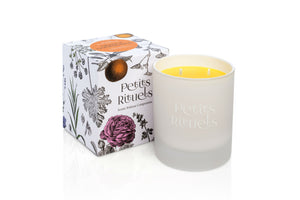 Orange Scented Candle with floral packaging.