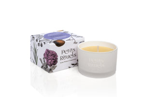 Ylang Ylang candle in travel size and white frosted glass and floral packaging.